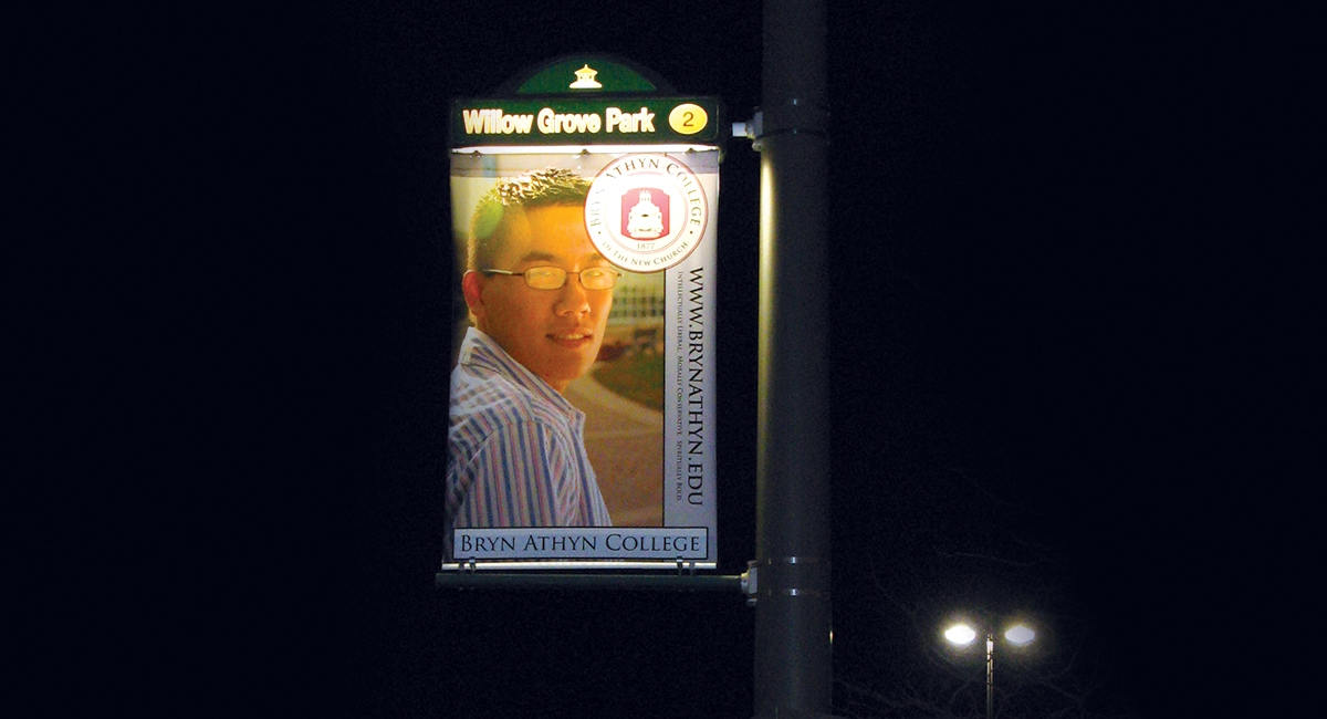 Image of a backlit Lumen Banner showcasing it's bright and easy to read lettering and lighting even at night.